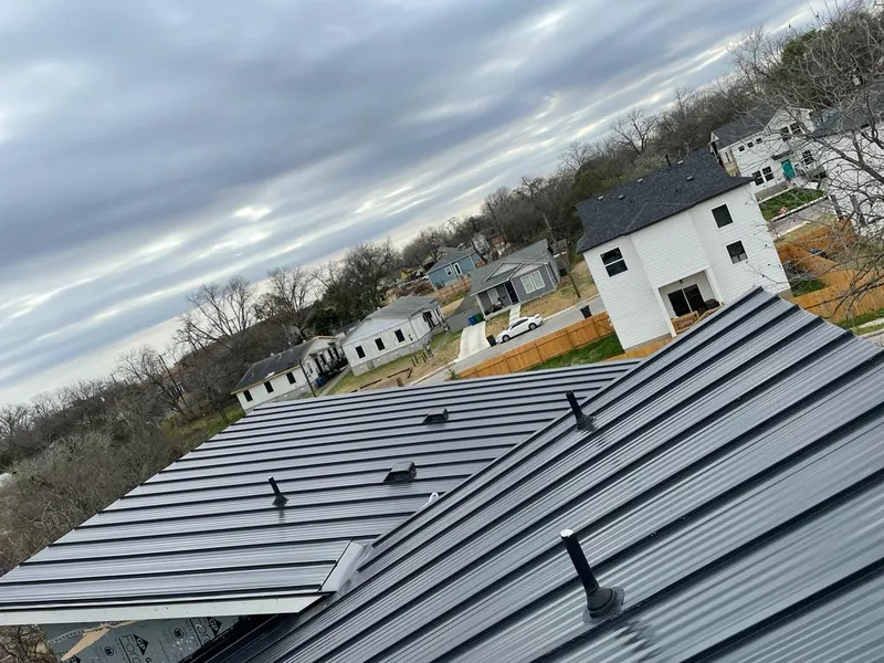 Standing seam metal roof panels with vents for Skylight Repair in Hickory Hills